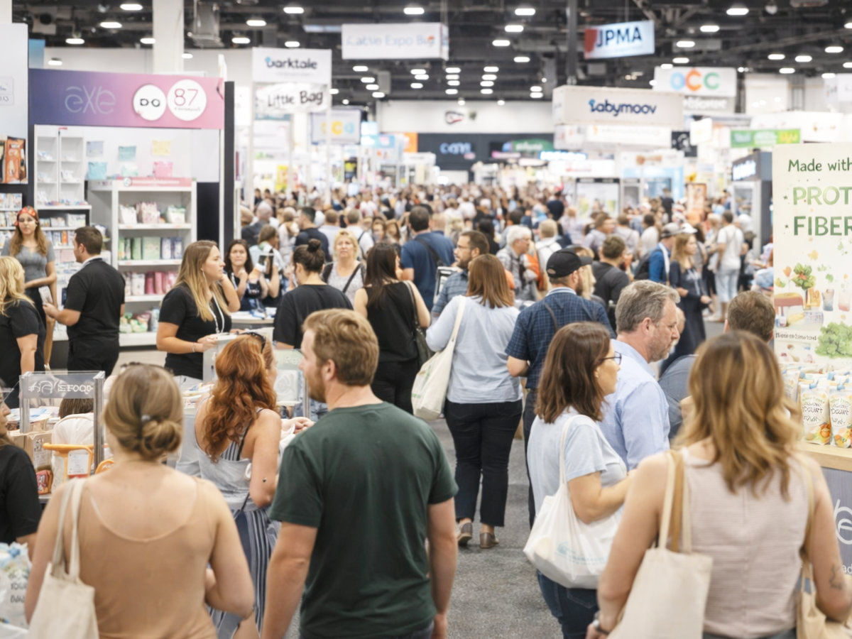 Trade show floor with industry professionals